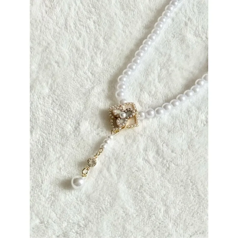 Faux pearl and cream rose statement necklace